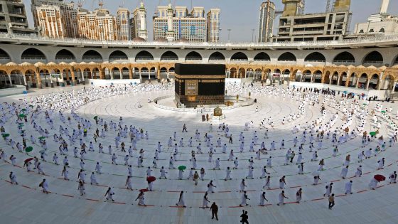 (FILES) In this file photo taken on July 31, 2020 pilgrims circumambulate around the Kaaba, the holiest shrine in the Grand mosque in the holy Saudi city of Mecca, on July 31, 2020 during the annual Muslim Hajj pilgrimage. Saudi Arabia will host another downsized hajj from July 17, 2021, with only residents fully vaccinated against the coronavirus permitted and overseas Muslim pilgrims barred for a second year. The kingdom seeks to repeat last year's success that saw no virus outbreak during the five-day Muslim ritual. It is allowing 60,000 residents of Saudi Arabia to participate, higher than in 2020 but drastically lower than in normal times. / AFP / STR